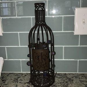 Wine cork holder in the shape of a wine bottle